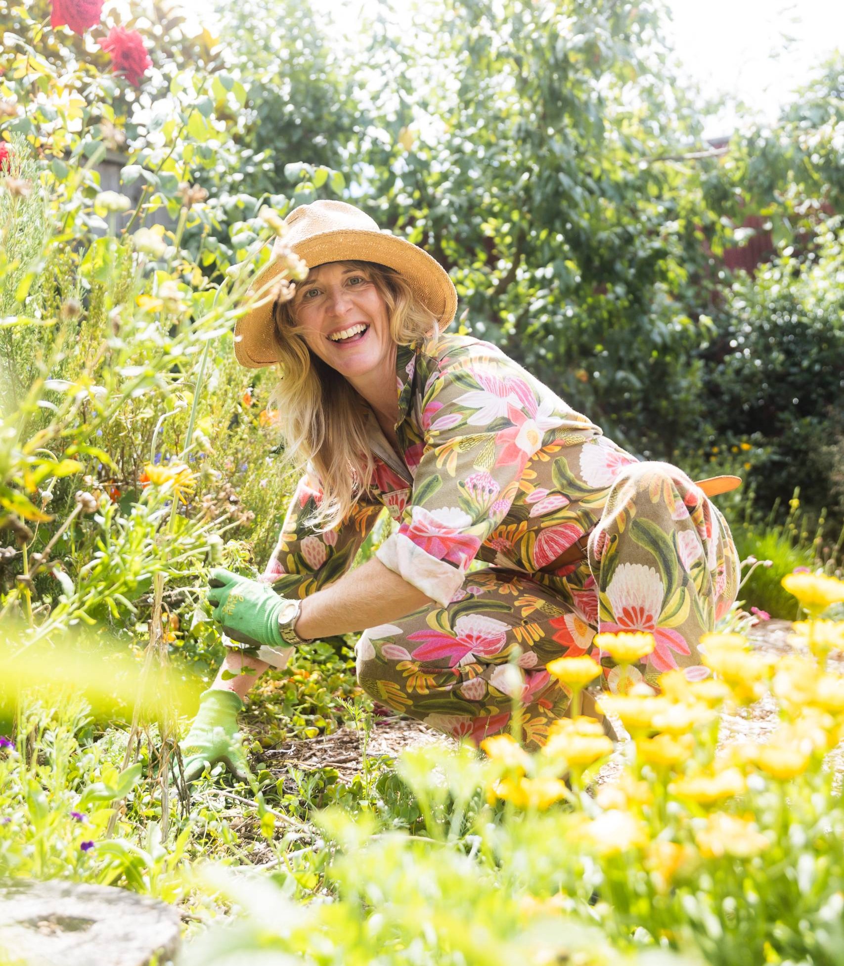 Haidi gardening among colourful plants